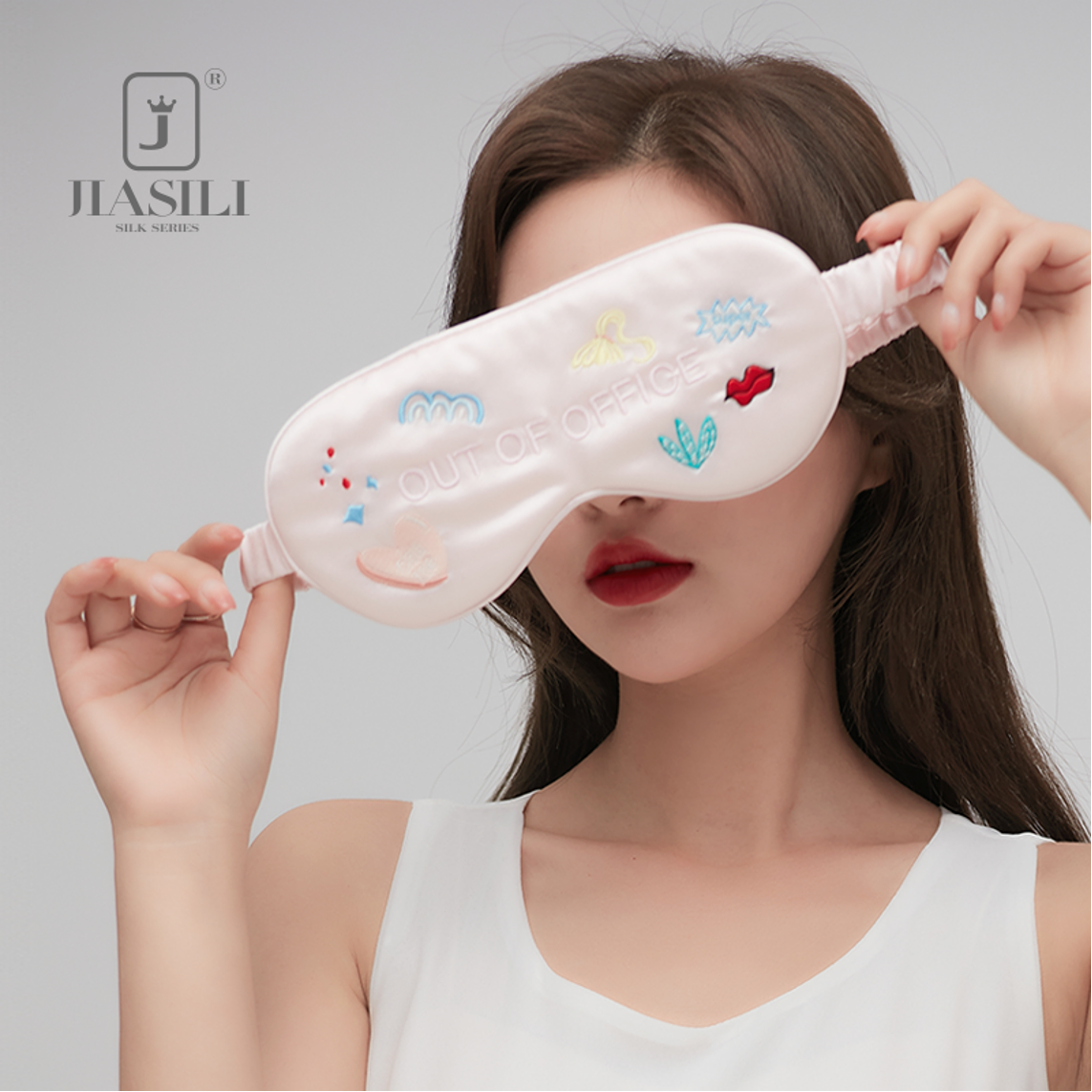 Jiasili silk eye mask detail showing the adjustable strap and embroidered finish