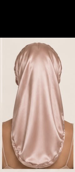 Back view of the long pink silk hair wrap covering the hair